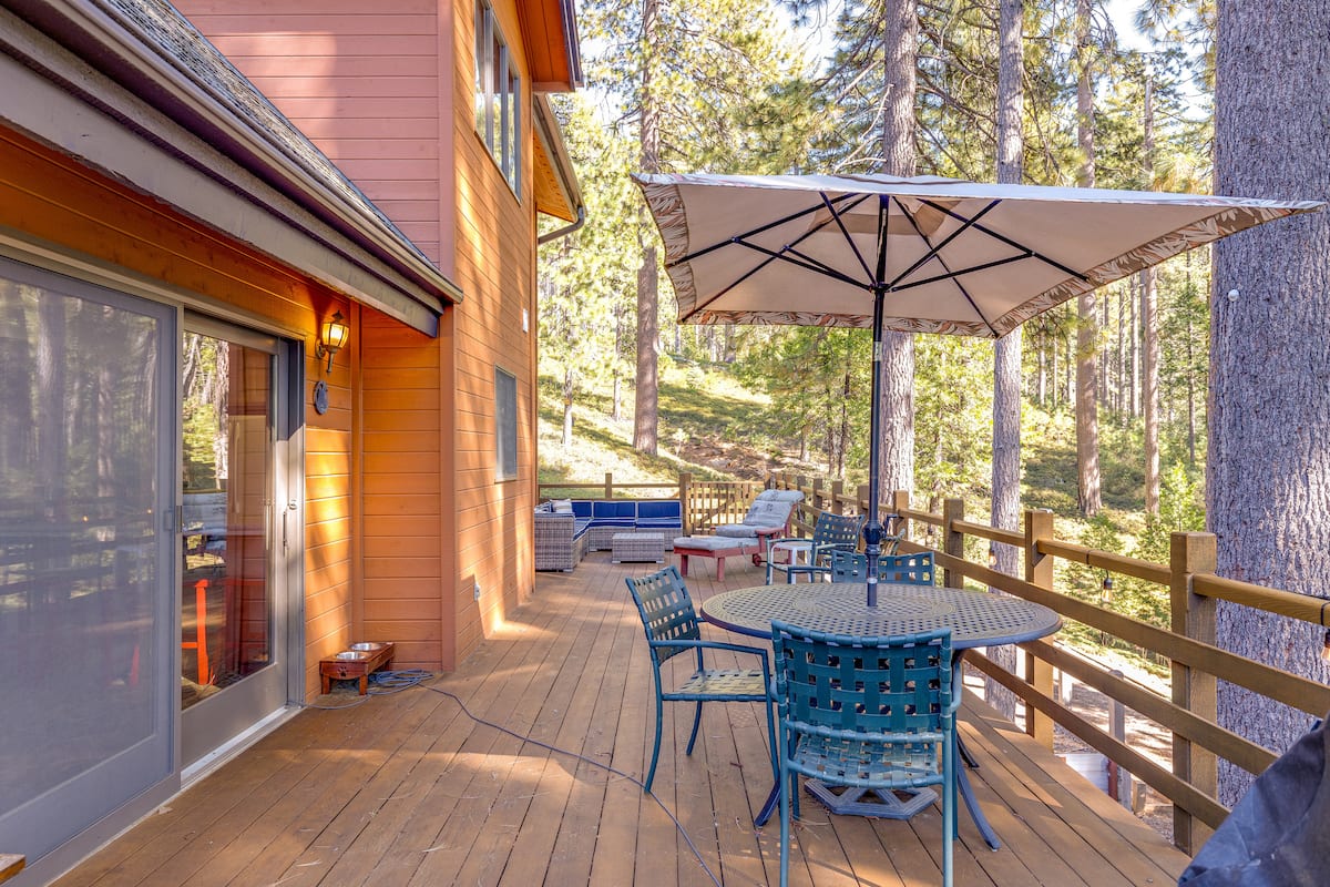 Deck off the main living room with seating and both grills